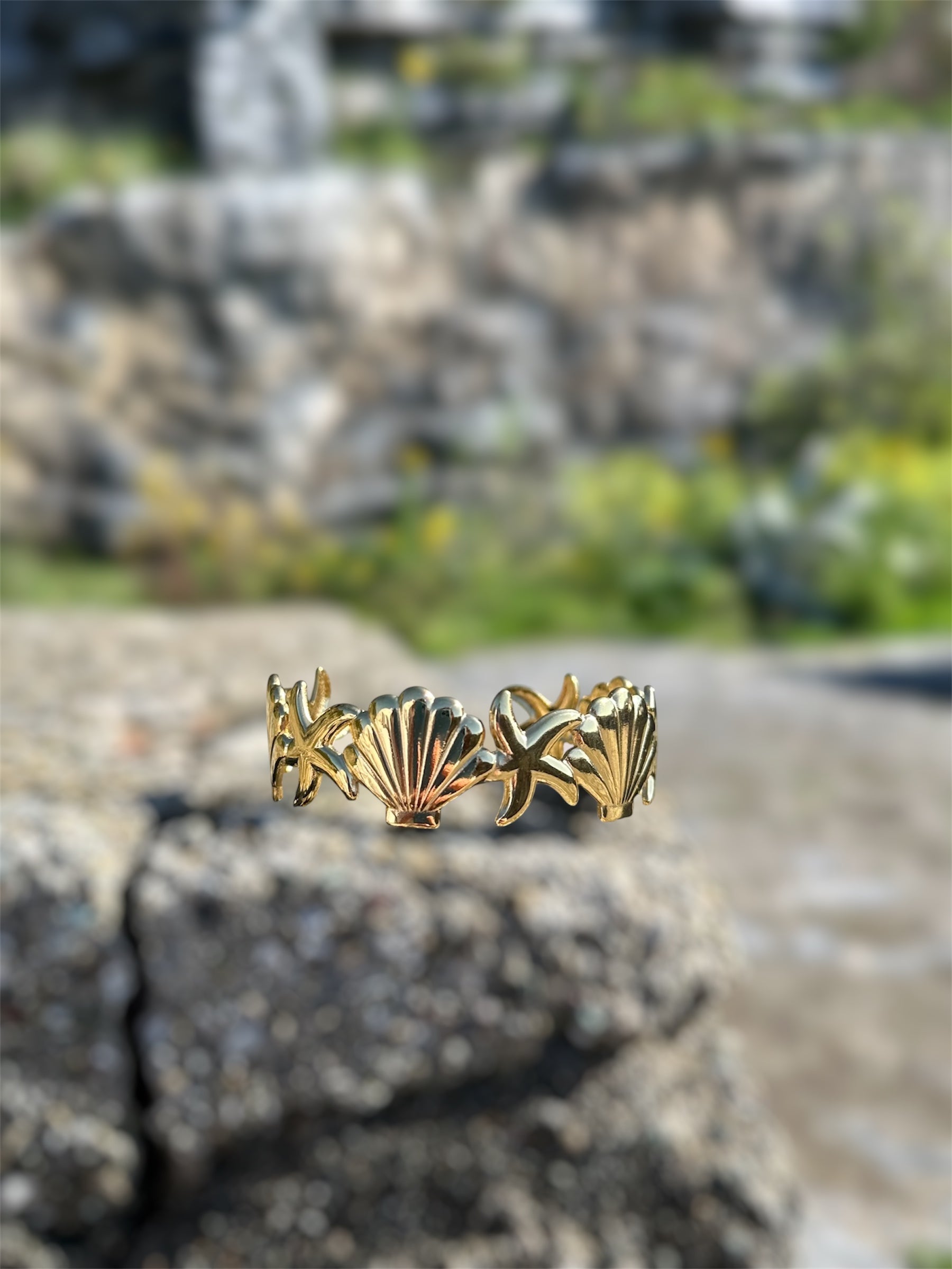 Bracciale stella/conchiglia